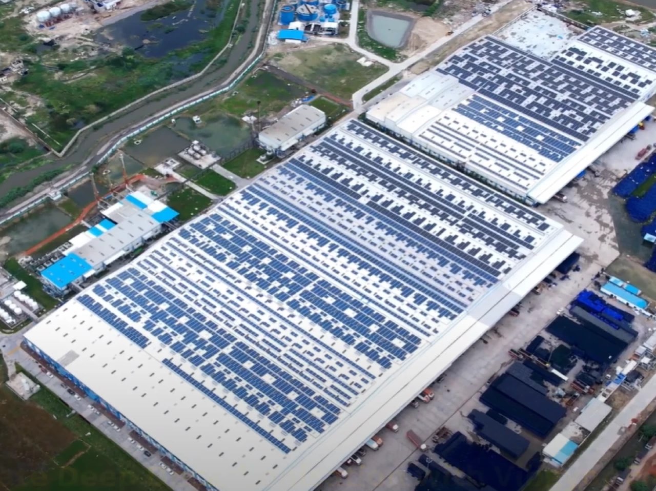 Aerial view of the Sandila plant, solar across tin-shed industrial roofing
